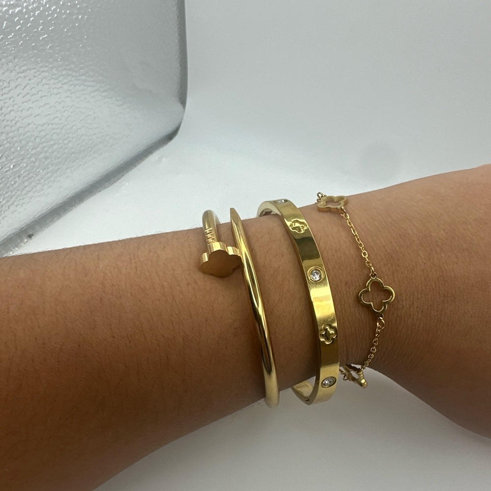Set of 3 stainless steel zircon bracelets.